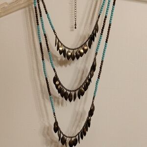 Elegant Brown and Blue Layered Necklace with Metallic Pendants